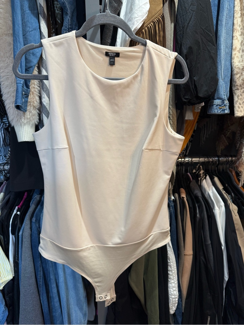 Express Cream Sleeveless Bodysuit
Faux leather